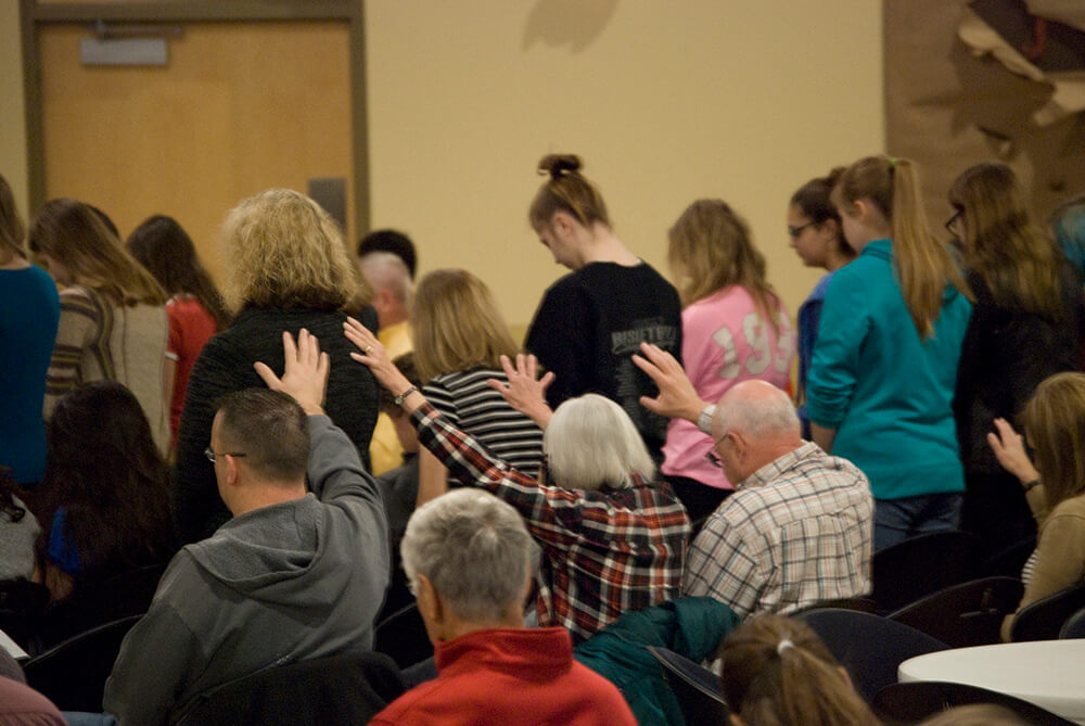 Horizons 2017 hands up prayer lincoln nebraska horizons church community family friends.jpg